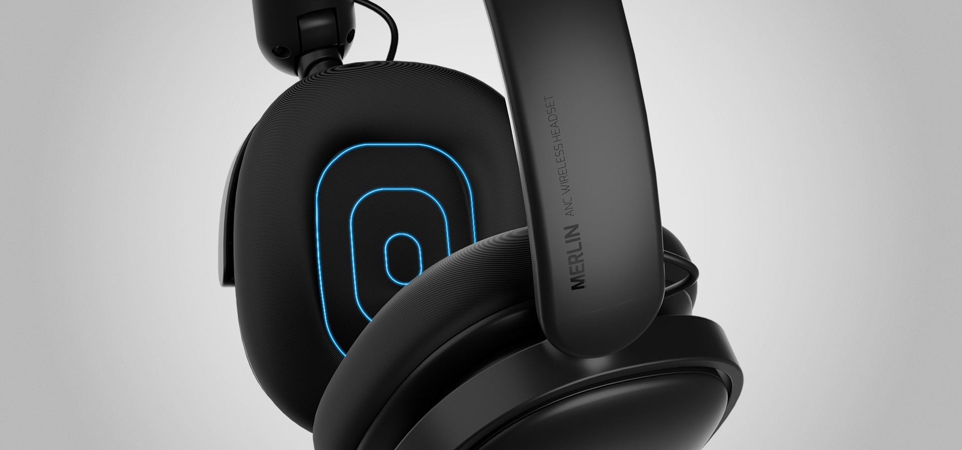 Over-ear headphones with black ear cushions and glowing blue accents on the ear cups.