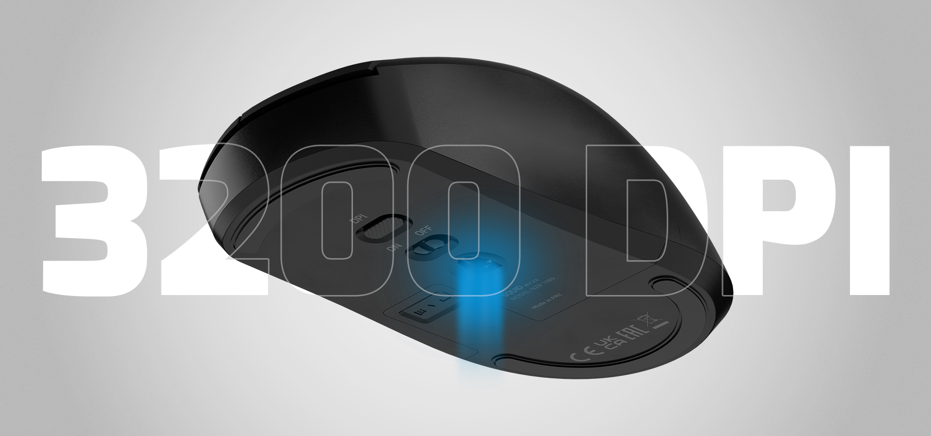 Black computer mouse with buttons and a glowing light on a gray background.