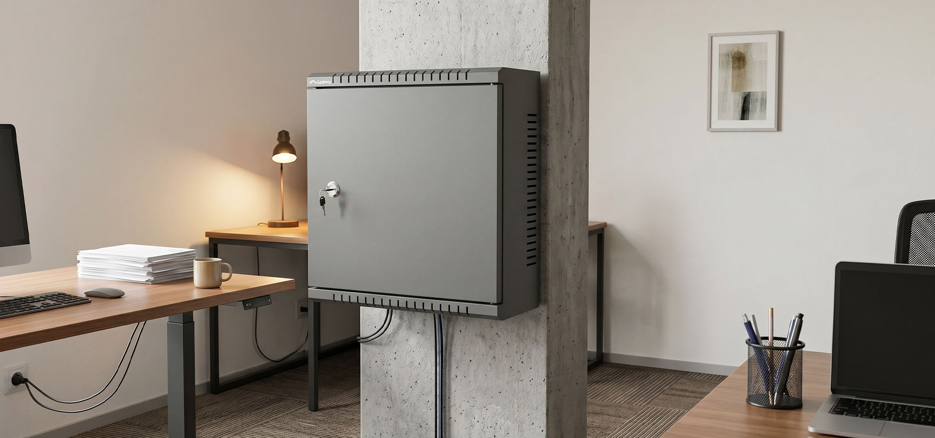 Gray wall-mounted cabinet attached to a column in a modern office setting.