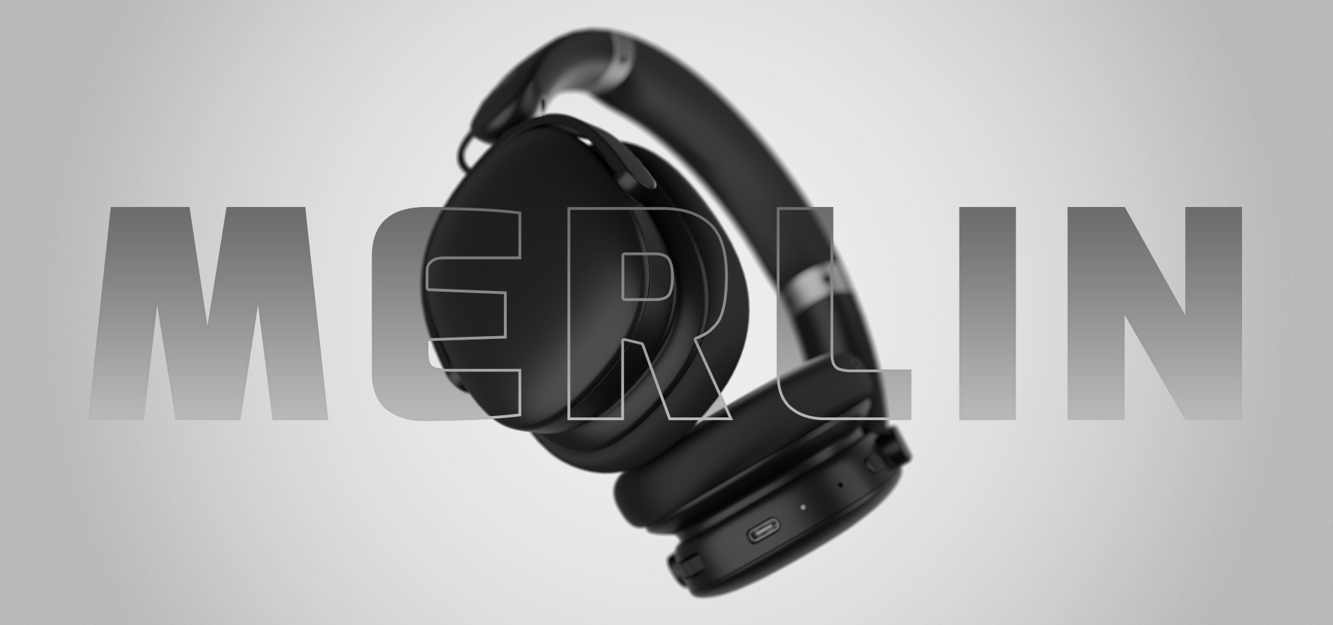 Black over-ear headphones with a sleek design and cushioned ear cups.
