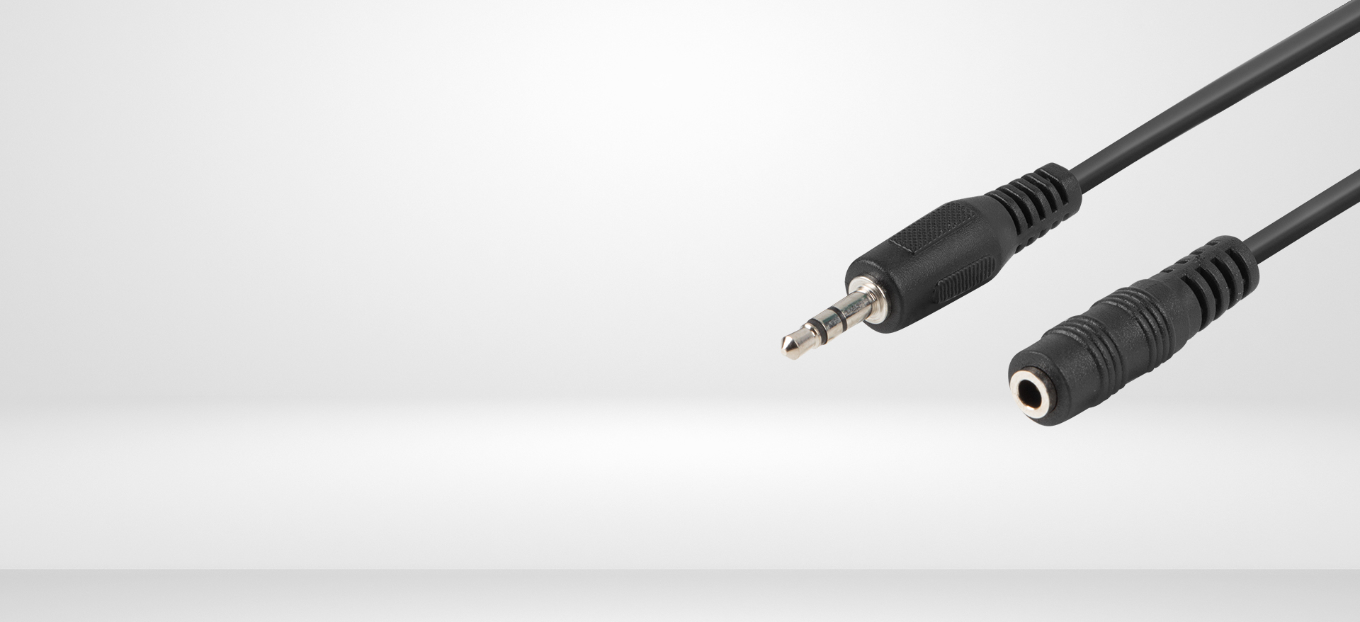 3.5mm audio extension cable with male and female connectors, 1.5 meters long, featuring a sleek black design
