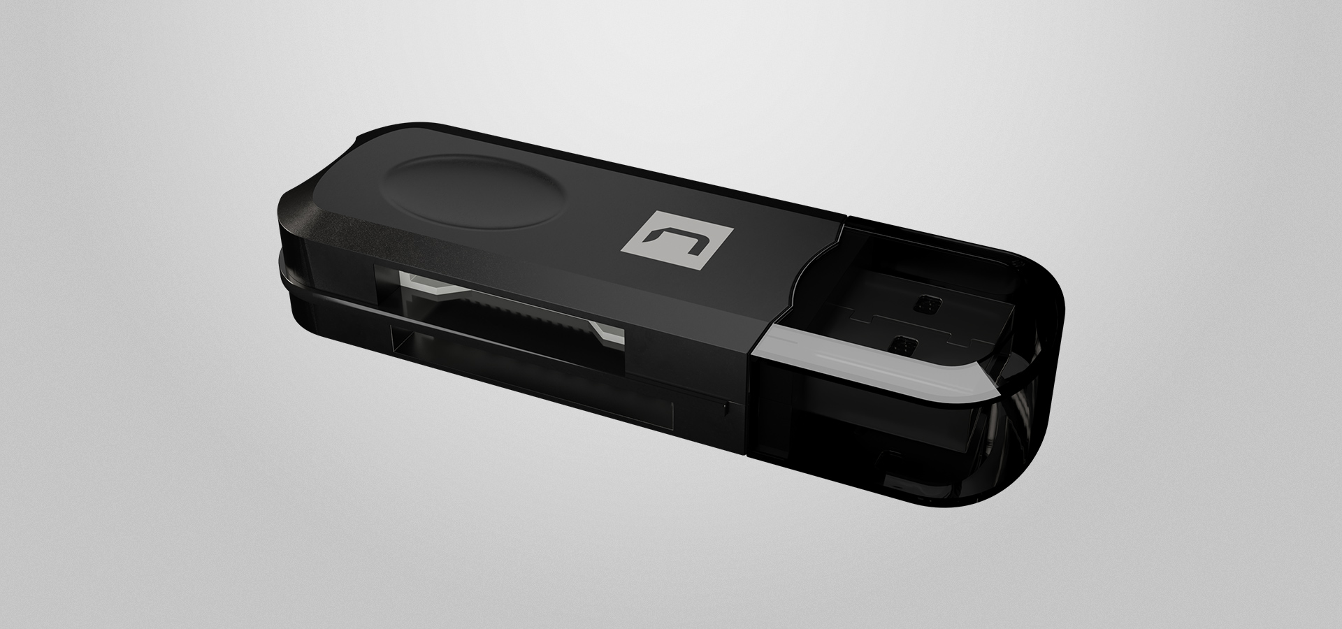 Kompaktowe czarne urządzenie z błyszczącą powierzchnią i portem na jednym końcu.