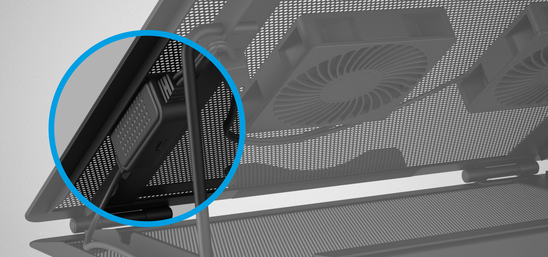 Laptop cooling stand with two fans, designed for laptops measuring 12.1 to 17.3 inches. Close-up view of a connector or adjustment feature