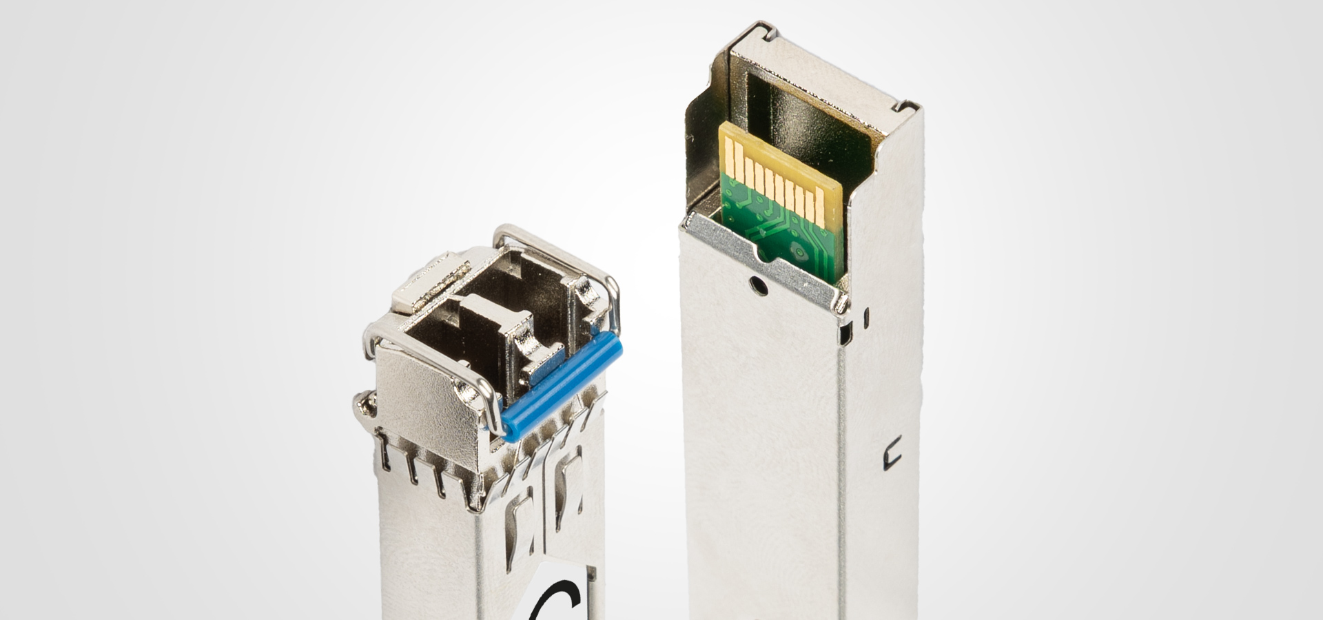 Two metal connectors with different designs for network communication and data transfer.