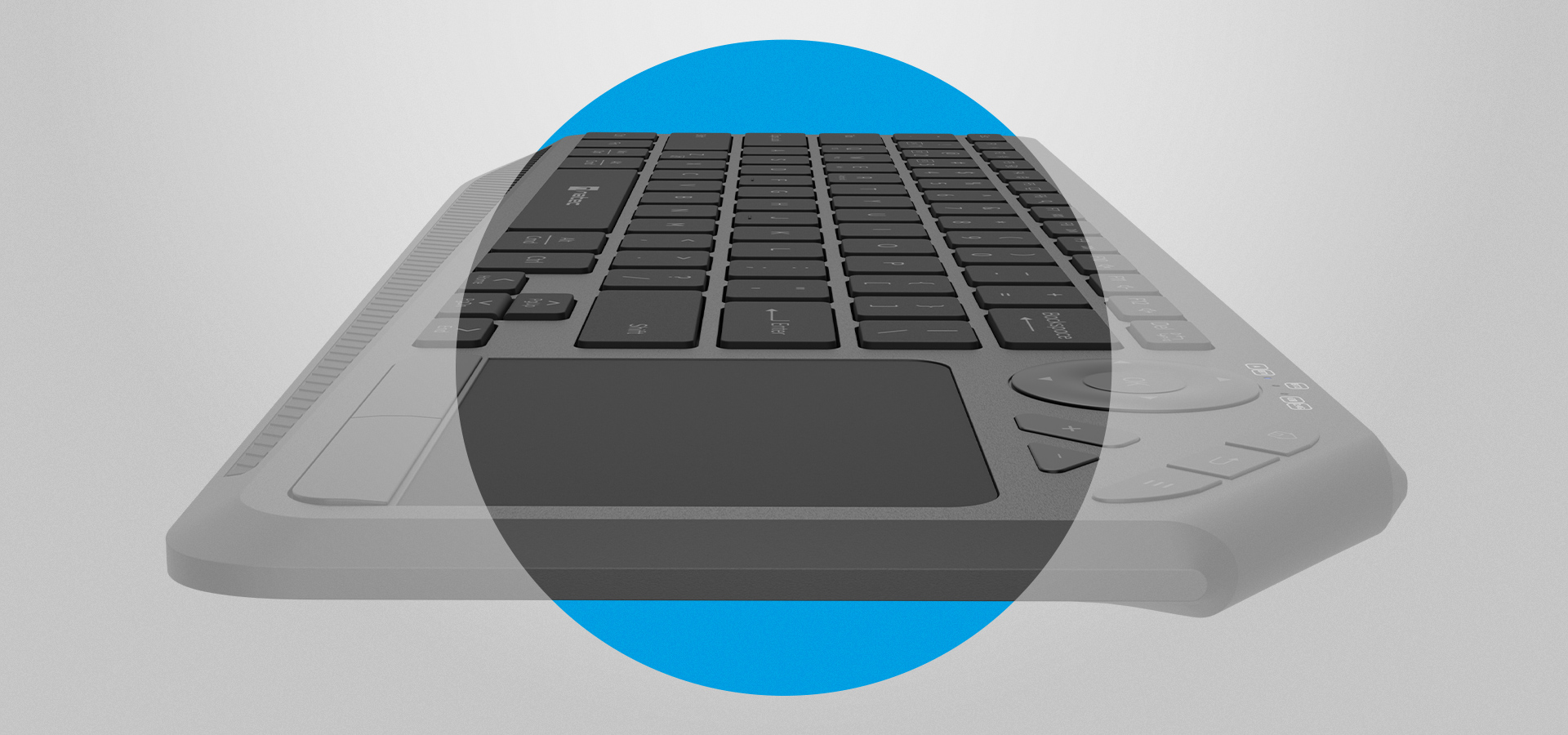 Zbliżenie na klawiaturę z wyraźnymi klawiszami i dużym obszarem dotykowym.